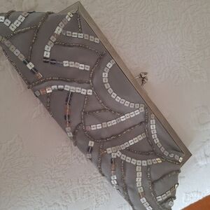 Metaphor Silver Clutch with Sequin Design